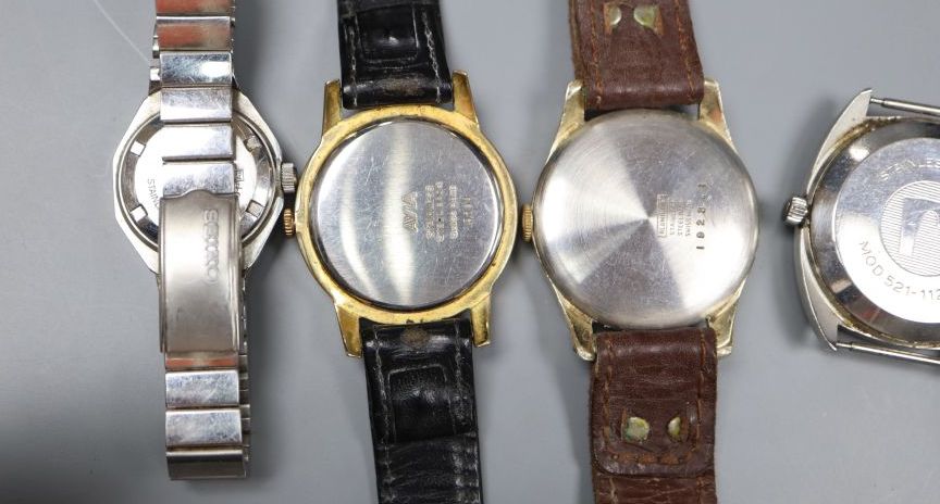 Seven assorted wrist watches, including Avia and Roamer.